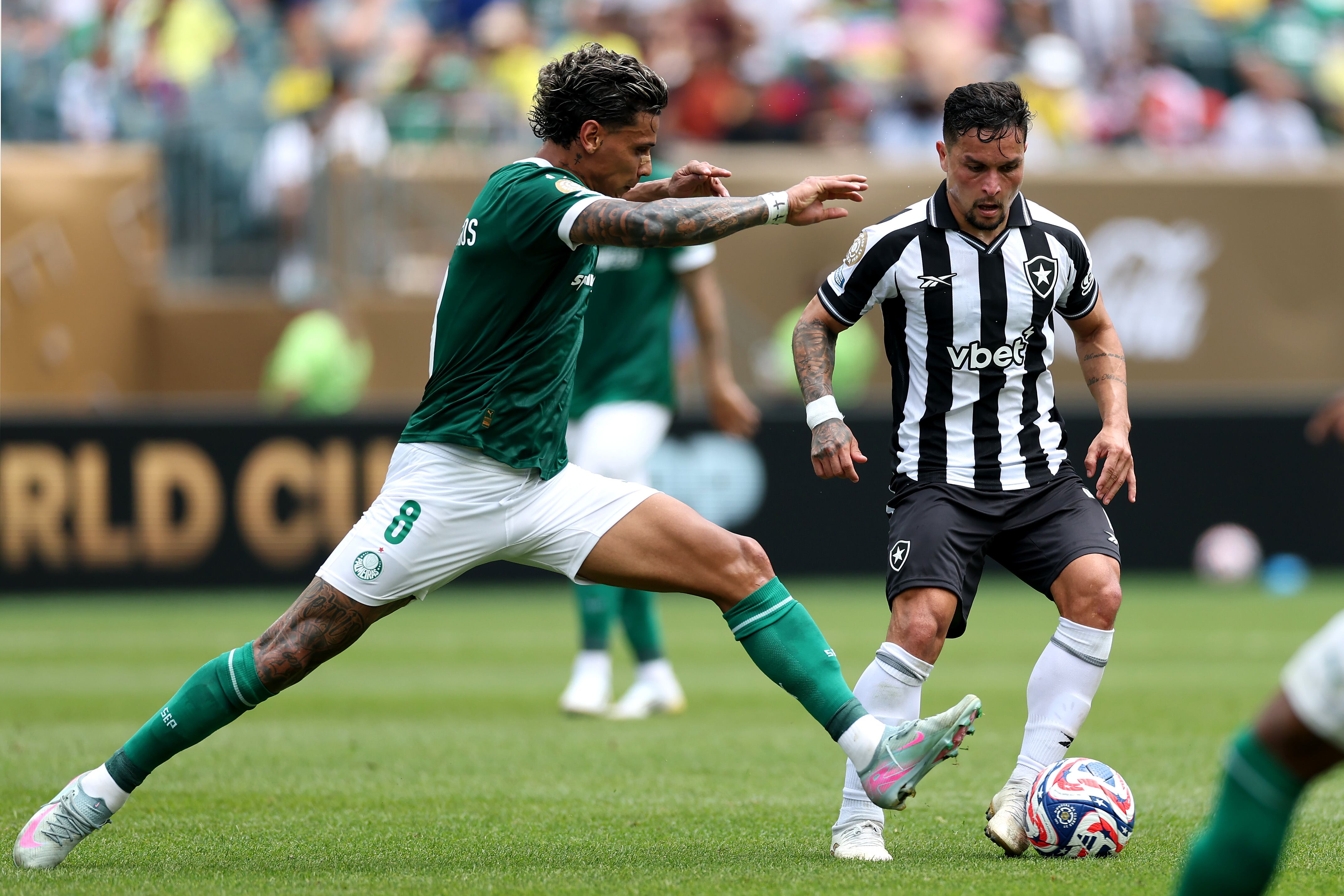 PHILADELPHIA, PENNSYLVANIA - JUNE 28: Artur #7 of Botafogo is challenged by Richard Rios #8 of Palmeiras during the FIFA Club World Cup 2025 round of 16 match between SE Palmeiras and Botafogo FR at Lincoln Financial Field on June 28, 2025 in Philadelphia, Pennsylvania. (Photo by Elsa - FIFA/FIFA via Getty Images)