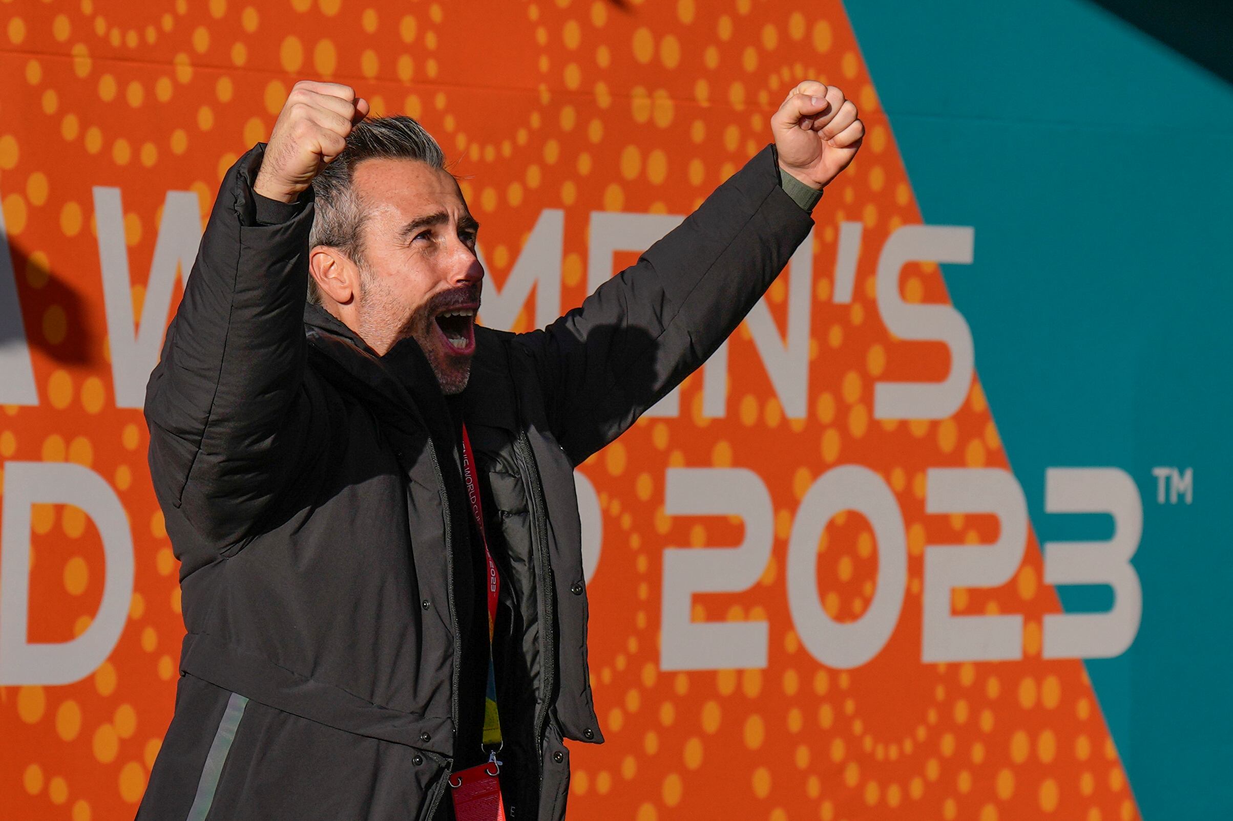 Spain's head coach Jorge Vilda gestures to supporters following their extra time win at the Women's World Cup quarterfinal soccer match against the Netherlands in Wellington, New Zealand, Friday, Aug. 11, 2023. (AP Photo/Alessandra Tarantino)