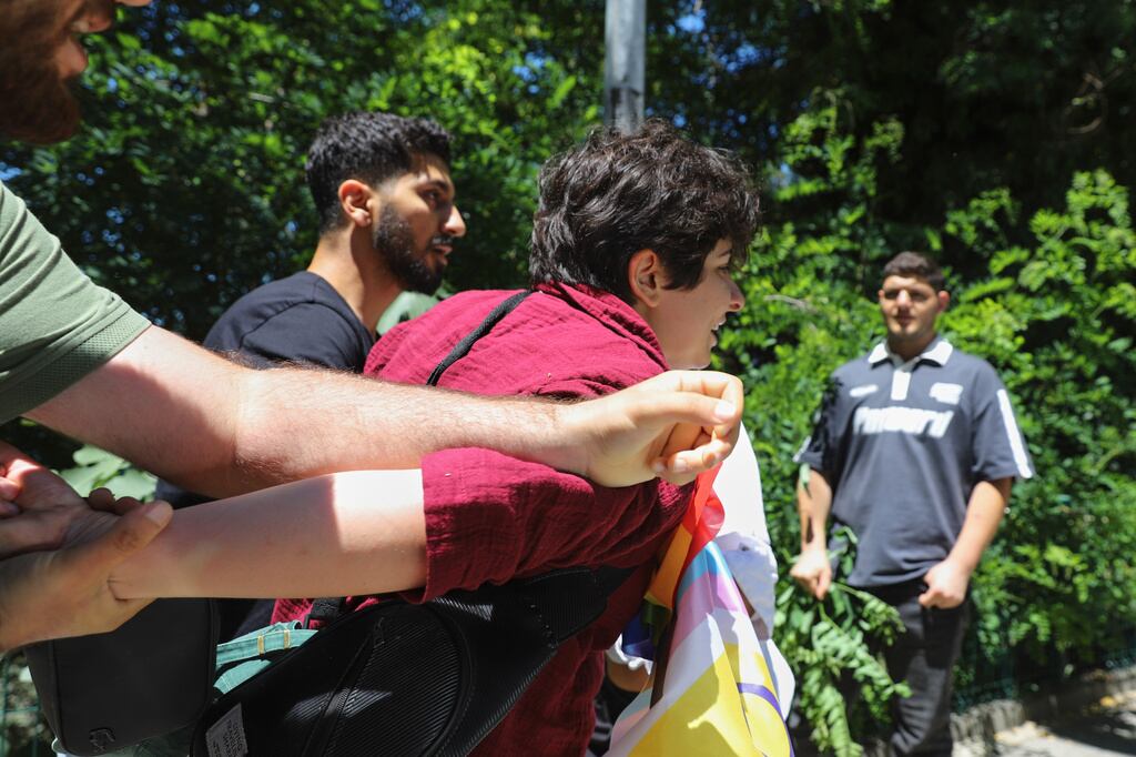 People are detained by police as they attempt to hold a Pride march, in Istanbul, Turkey, Sunday, June 28, 2026. (AP Photo/Dilara Acikgoz)
