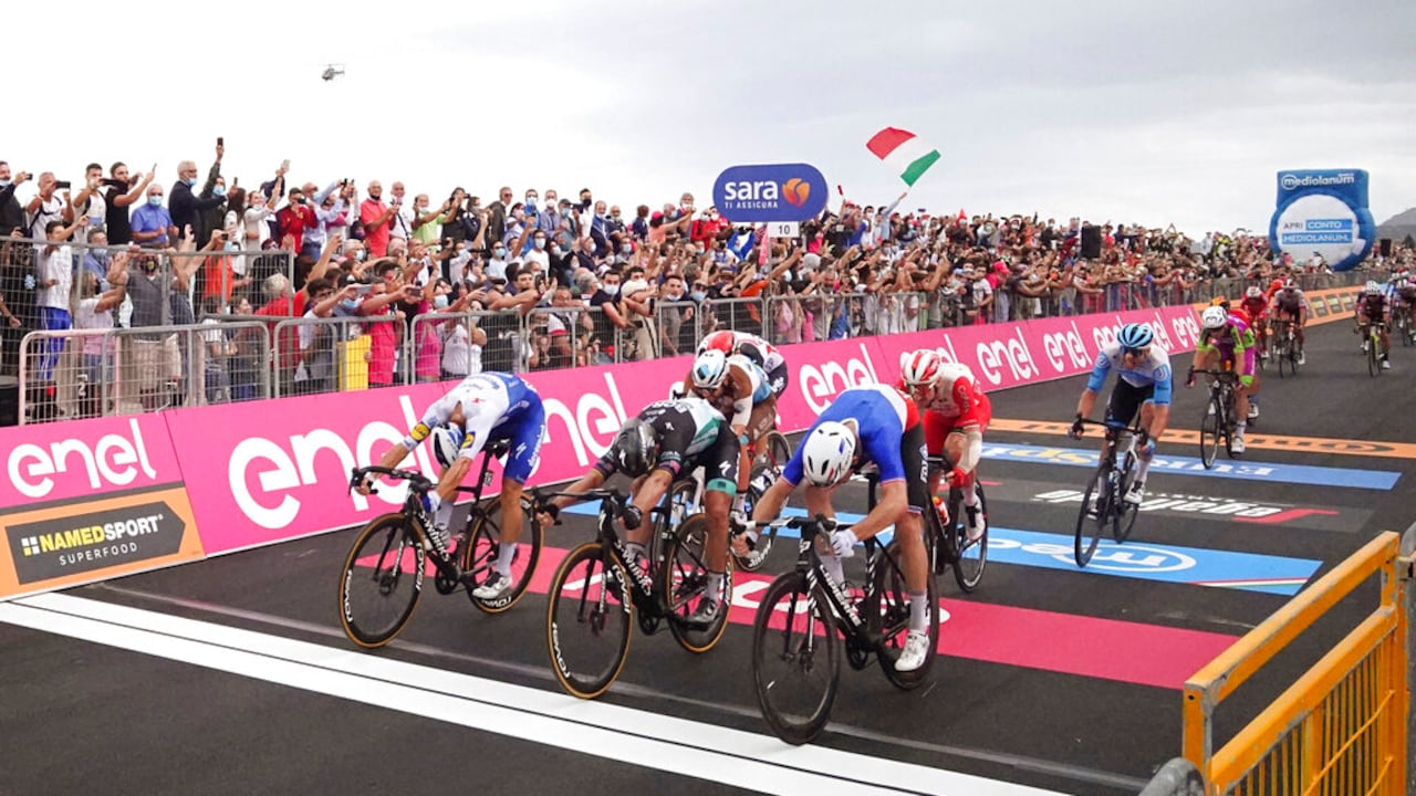 France's Arnaud Demare, right, sprints to win the fourth stage of the Giro d'Italia, tour of Italy cycling race from Catania to Villafranca Tirrena, Sicily, Tuesday, Oct. 6, 2020. (Massimo Paolone/LaPresse via AP)