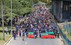 Indigenous people march in protest against a tax reform proposed by the government, in Cali, Colombia, Wednesday, May 5, 2021. Protests that began last week over a tax reform proposal continue despite President Ivan Duque's withdrawal of the tax plan on Sunday, May 2. (AP Photo/Andres Gonzalez)
