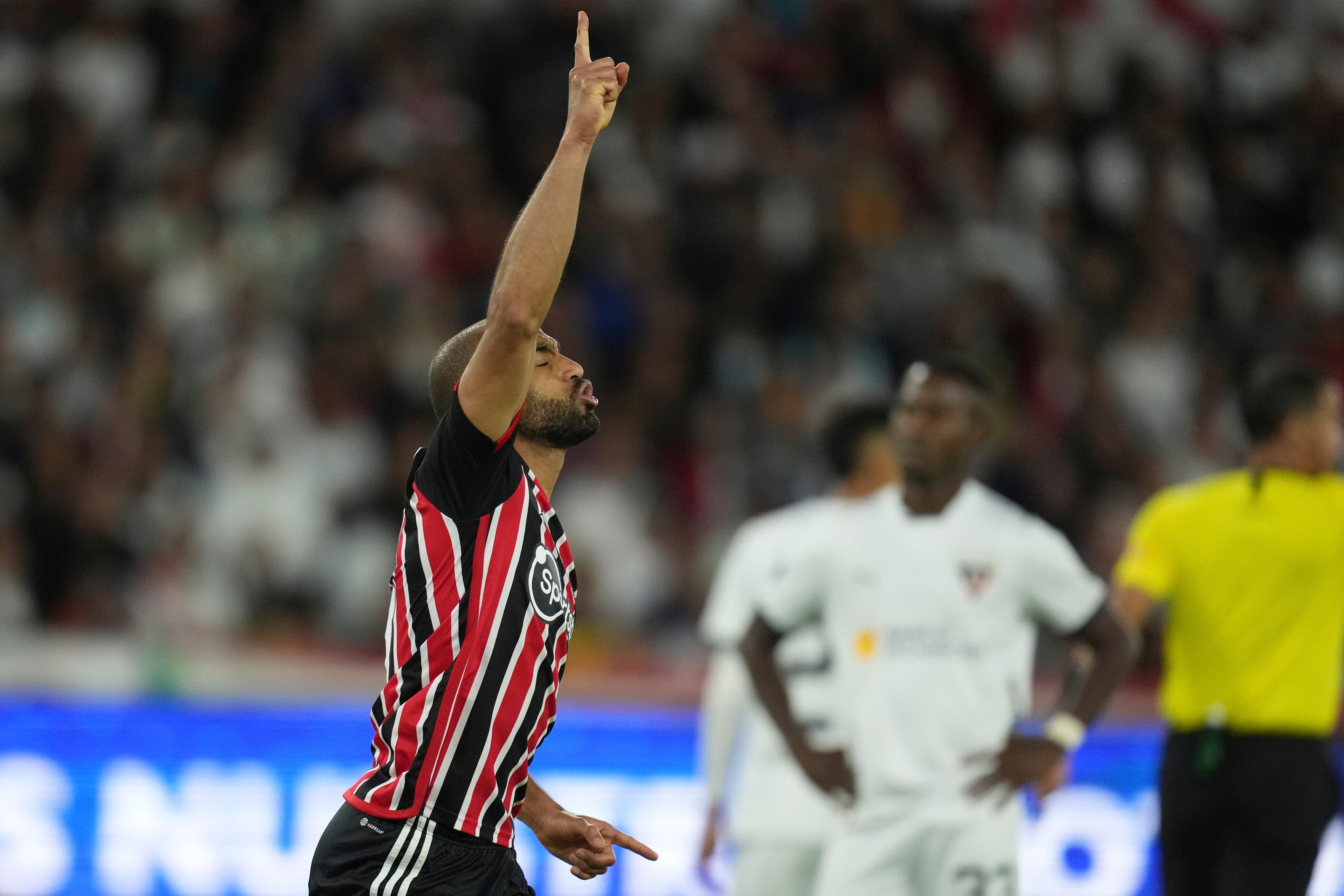 Lucas Moura of Brazil's Sao Paulo celebrates scoring his team's only goal against Ecuador's Liga Deportiva Universitaria during a Copa Sudamericana quarterfinal, first leg soccer match at Rodrigo Paz Delgado stadium in Quito, Ecuador, Thursday, Aug. 24, 2023. (AP Photo/Dolores Ochoa)