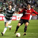 Manchester United's Cristiano Ronaldo, right, and Omonia's Paris Psaltis fight for the ball during the Europa League group E soccer match between Omonia and Manchester United at GSP stadium in Nicosia, Cyprus, Thursday, Oct. 6, 2022. (AP Photo/Maria Karadjias)