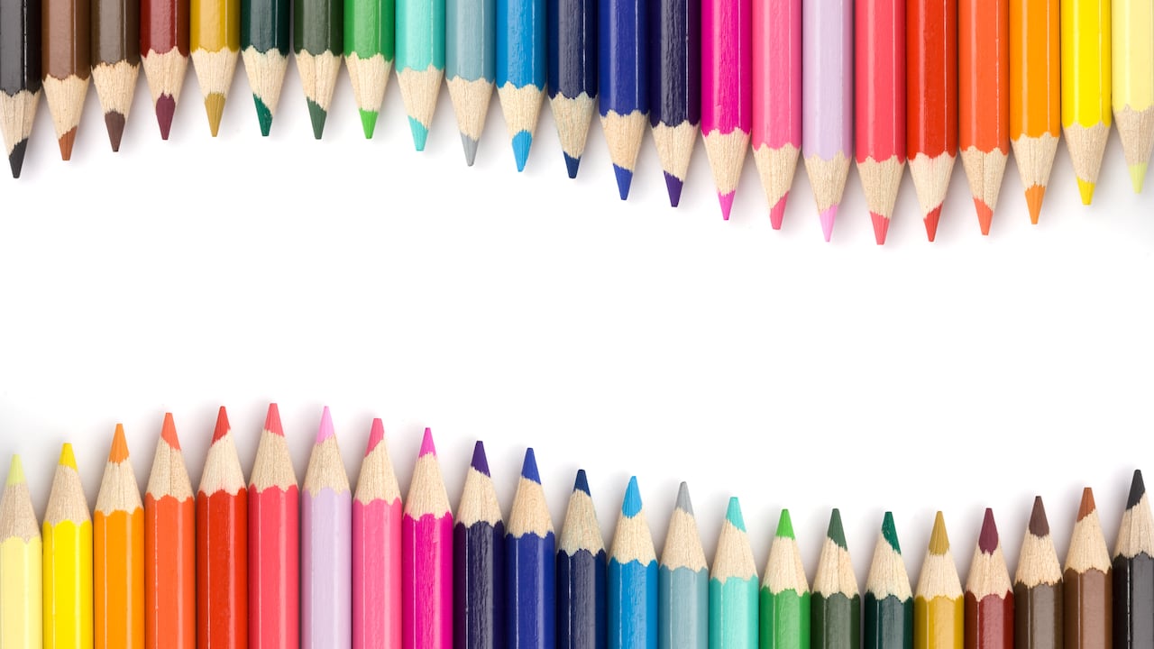 Top view of colored pencils frame arranged on white background.Similar: