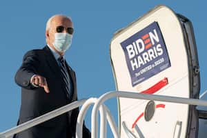 Democratic presidential candidate former Vice President Joe Biden boards his campaign plane at Raleigh-Durham International Airport in Morrisville, N.C., Sunday, Oct. 18, 2020, en route to Wilmington, Del. (AP Photo/Carolyn Kaster)