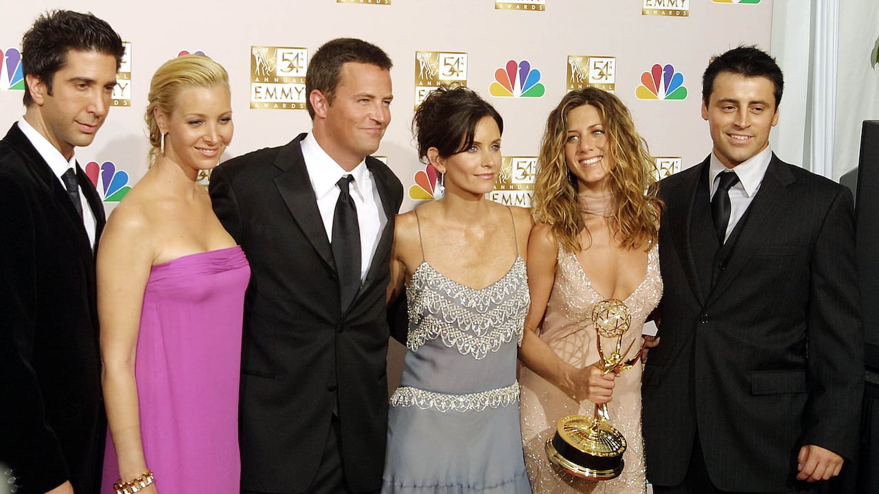 (FILES) In this file photo cast members from "Friends," which won Outstanding Comedy, series pose for photogarpher at the 54th Annual Emmy Awards at the Shrine Auditorium in Los Angeles 22 September 2002. - "The One Where They Get Back Together" is finally upon us -- and the cast of "Friends" will be joined by famous fans from Justin Bieber to David Beckham, HBO Max announced on May 13, 2021. The long-delayed and much-hyped reunion, billed as an "unscripted celebration" of the US smash hit television sitcom, will debut on May 27, the streaming platform said in a statement.A brief trailer for "Friends: The Reunion" showed the six cast members walking slowly away from the camera with their arms linked together, while the iconic "I'll Be There For You" theme song plays gently in the background. (Photo by LEE CELANO / AFP)