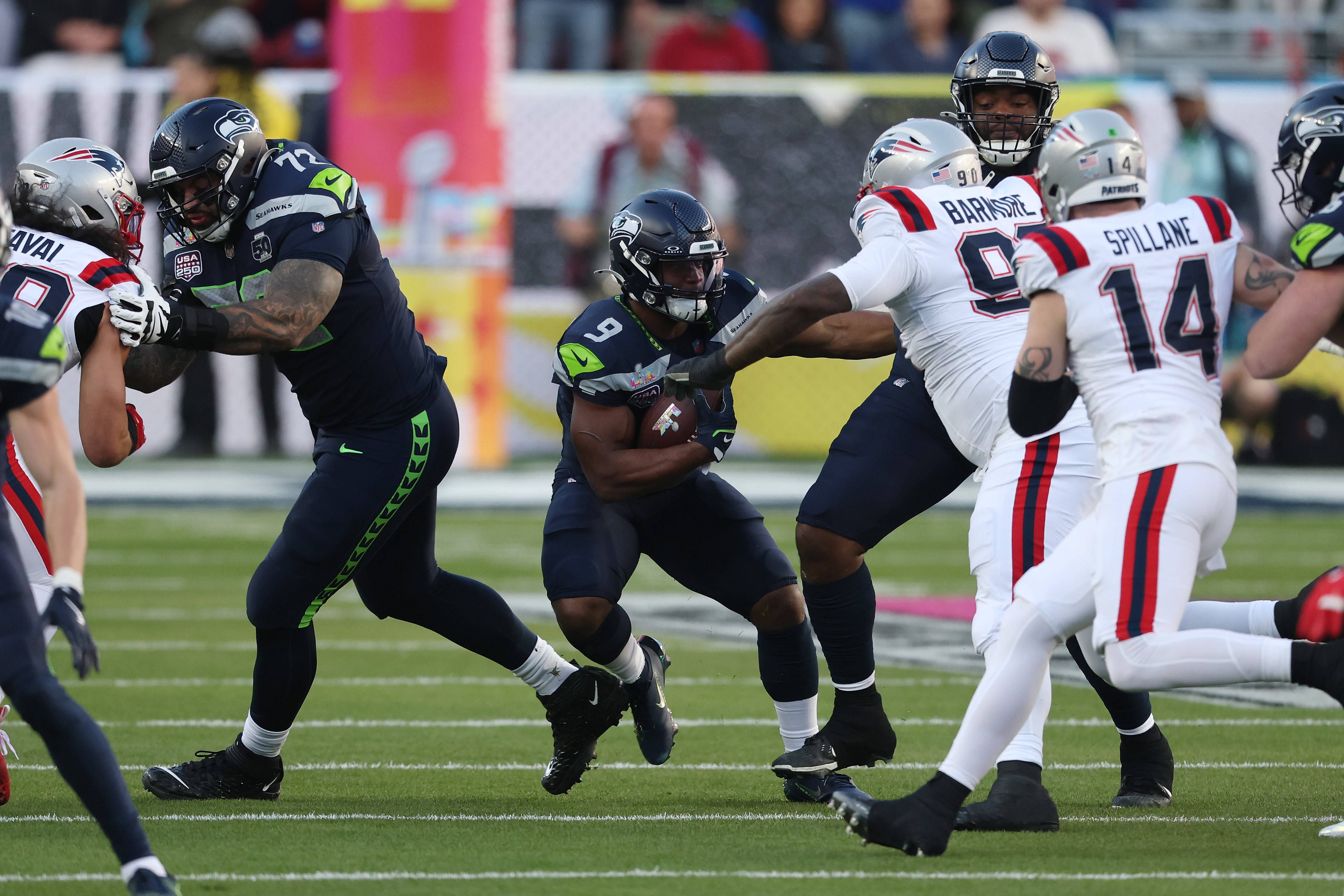 SANTA CLARA, CALIFORNIA - FEBRUARY 08: Drake Maye #10 of the New England Patriots throws under pressure from Devon Witherspoon #21 of the Seattle Seahawks during the first quarter in Super Bowl LX at Levi's Stadium on February 08, 2026 in Santa Clara, California. (Photo by Ishika Samant/Getty Images)