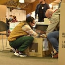 Votación, voto, elecciones, gente votando, urnas, puesto de votación, mesa en Bogotá, Corferias