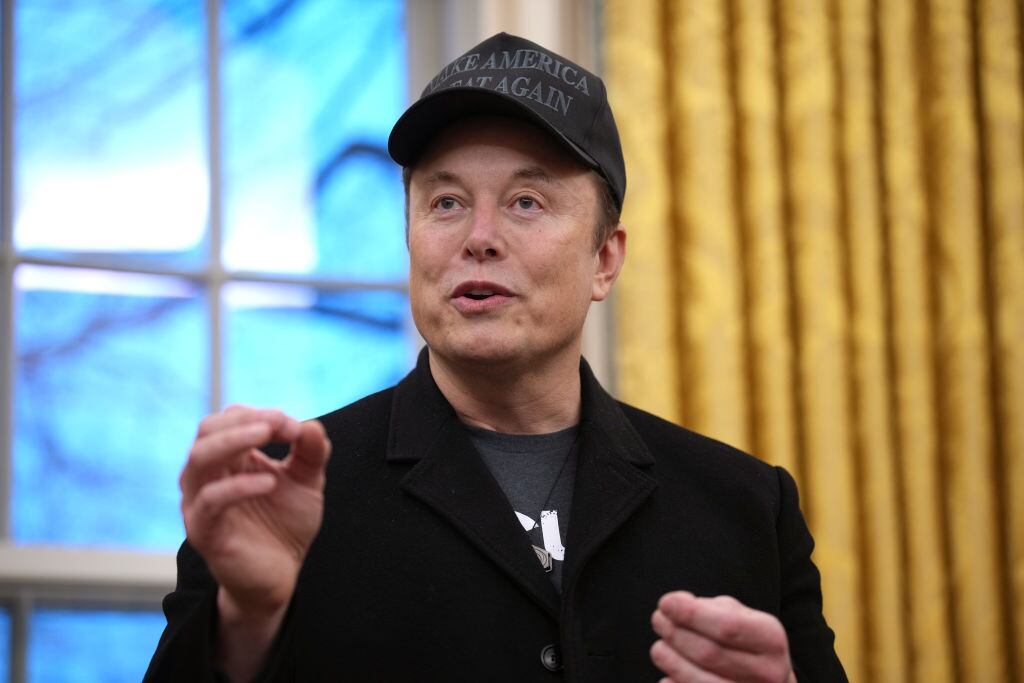 WASHINGTON, DC - FEBRUARY 11: Tesla and SpaceX CEO Elon Musk delivers remarks as he joins U.S. President Donald Trump during an executive order signing in the Oval Office at the White House on February 11, 2025 in Washington, DC. Trump is to sign an executive order implementing the Department of Government Efficiency’s (DOGE) "workforce optimization initiative," which, according to Trump, will encourage agencies to limit hiring and reduce the size of the federal government. (Photo by Andrew Harnik/Getty Images)