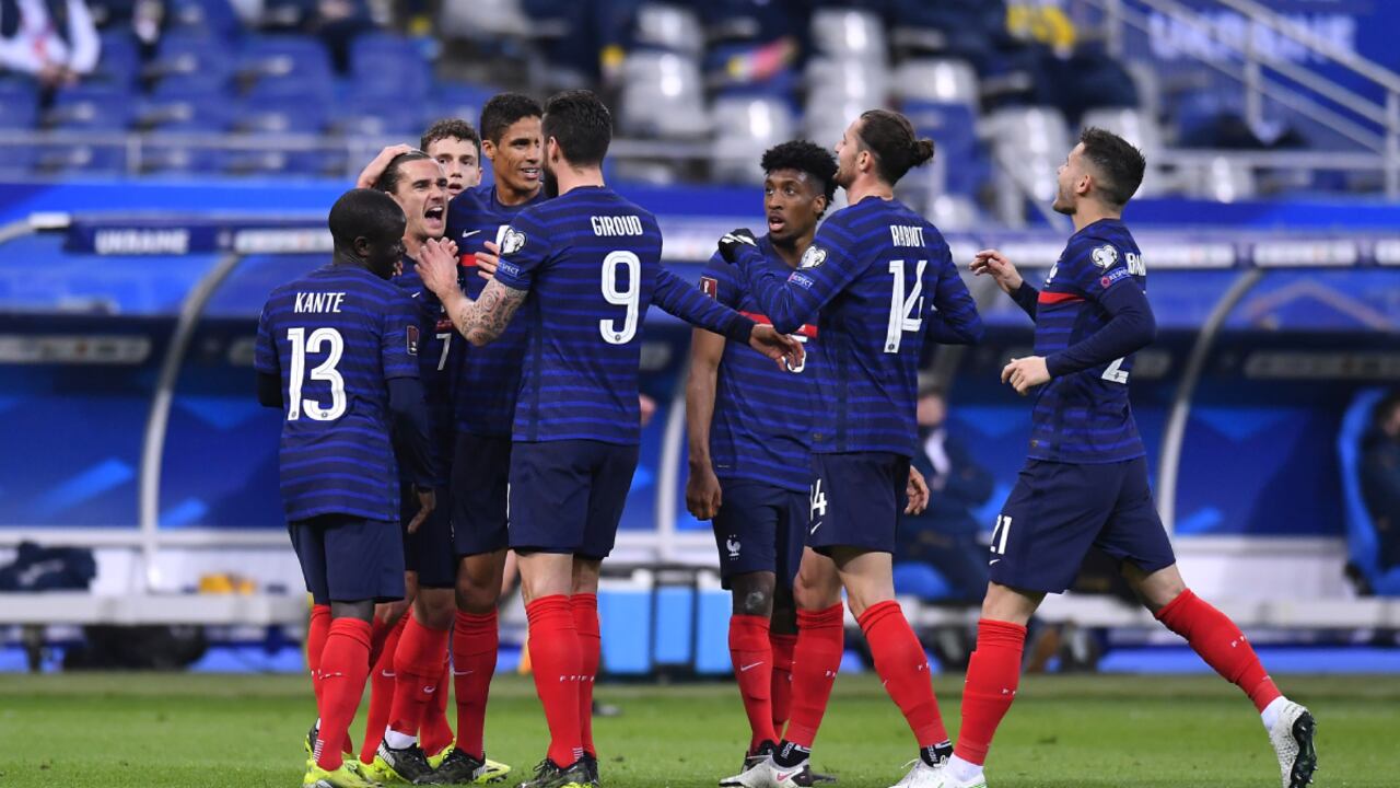 PARIS, FRANCE - MARCH 24: Antoine Griezmann of France celebrates with team mates after scoring their side's first goal during the FIFA World Cup 2022 Qatar qualifying match between France and Ukraine on March 24, 2021 in Paris, France. Sporting stadiums around France remain under strict restrictions due to the Coronavirus Pandemic as Government social distancing laws prohibit fans inside venues resulting in games being played behind closed doors. (Photo by Getty Images/Aurelien Meunier)