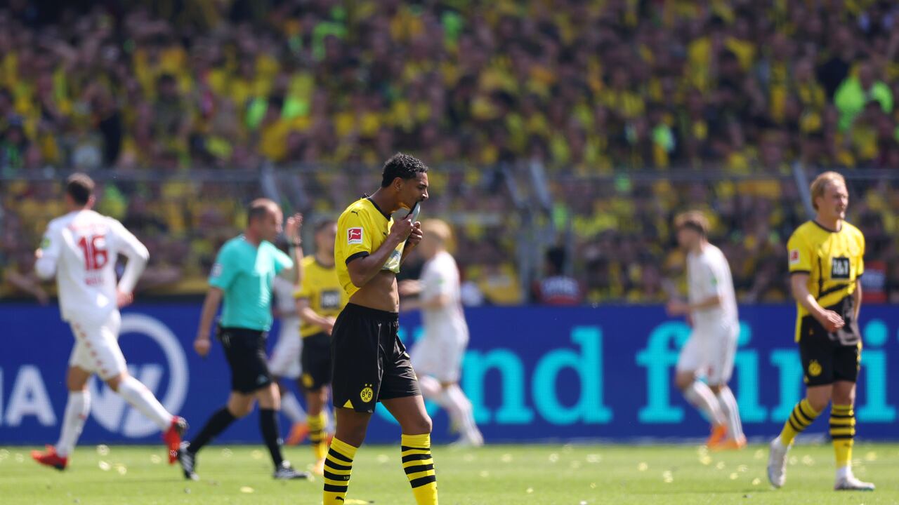 DORTMUND, GERMANY - MAY 27: Sebastien Haller of Borussia Dortmund reacts after Karim Onisiwo of 1.FSV Mainz 05 (not pictured) scored their sides second goal during the Bundesliga match between Borussia Dortmund and 1. FSV Mainz 05 at Signal Iduna Park on May 27, 2023 in Dortmund, Germany. (Photo by Lars Baron/Getty Images)