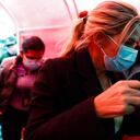 Bolivia's former interim President Jeanine Anez is escorted into a police station after giving her statement at the prosectors's office, in La Paz, Bolivia, Saturday, March 13, 2021. The conservative interim president who led Bolivia for a year was arrested Saturday as officials of the restored leftist government pursue those involved in the 2019 ouster of socialist leader Evo Morales, which they regard as a coup, and the administration that followed. (AP Photo/Juan Karita)