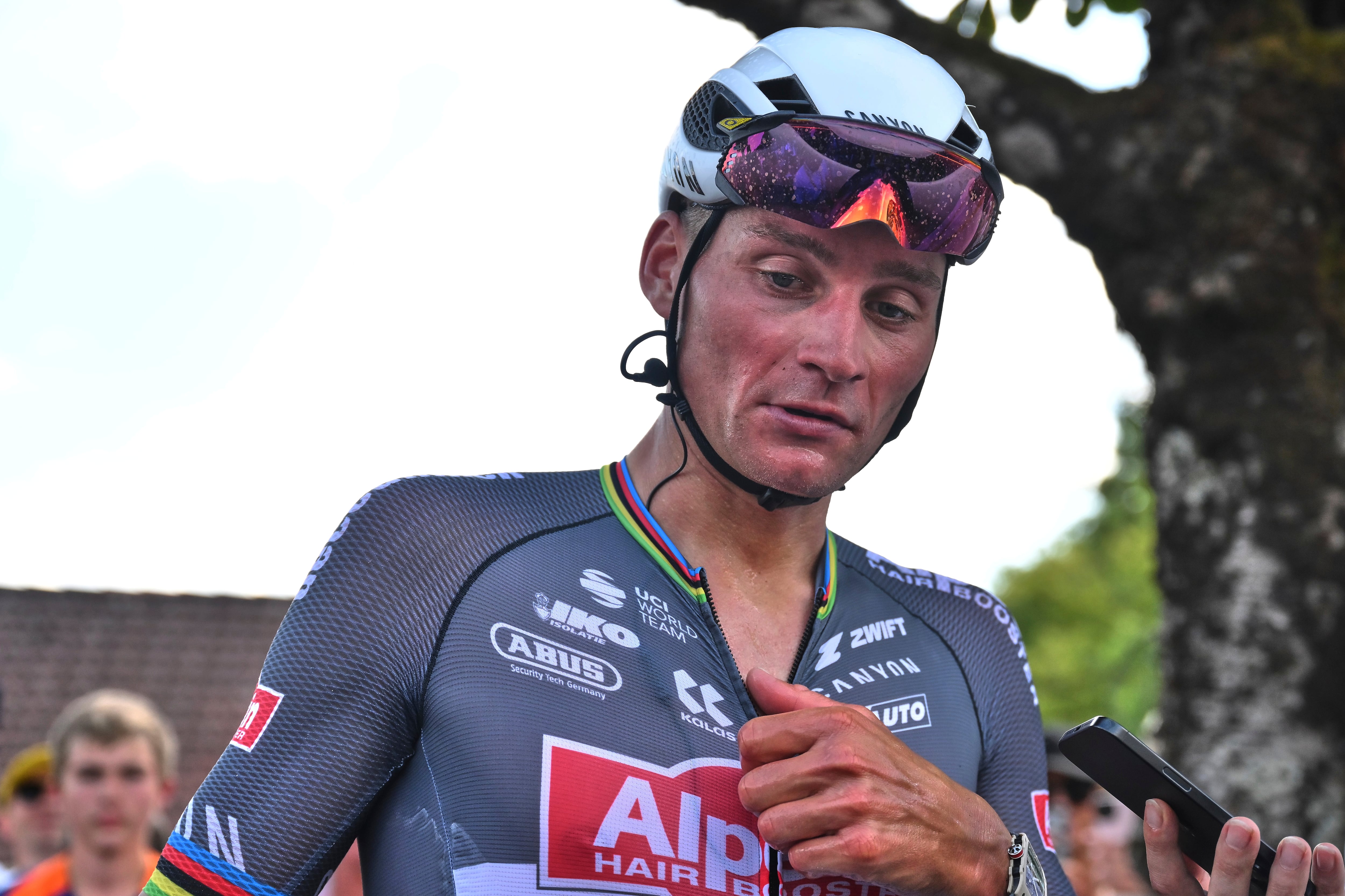 Netherlands' Mathieu van der Poel, who rode breakaway the entire stage but got caught by the pack in the last kilometer of the race, reacts after the ninth stage of the Tour de France cycling race over 174.1 kilometers (108 miles) with start in Chinon and finish in Chateauroux, France, Sunday, July 13, 2025. (Marco Bertorello/Pool Photo via AP)