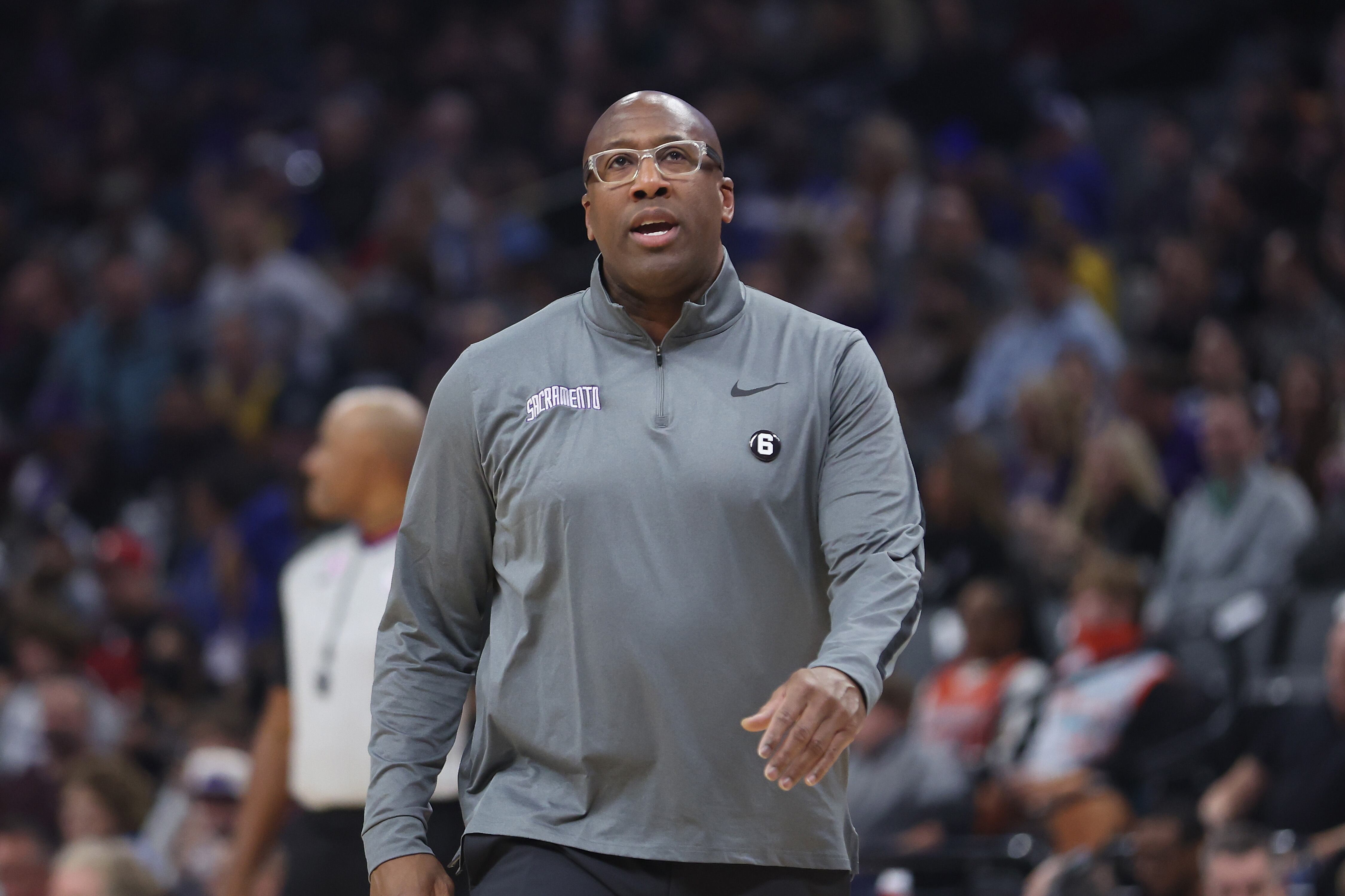 SACRAMENTO, CALIFORNIA - NOVEMBER 13: Mike Brown, head coach of the Sacramento Kings, looks on during the game against the Golden State Warriors at Golden 1 Center on November 13, 2022 in Sacramento, California. NOTE TO USER: User expressly acknowledges and agrees that, by downloading and/or using this photograph, User is consenting to the terms and conditions of the Getty Images License Agreement. (Photo by Lachlan Cunningham/Getty Images)