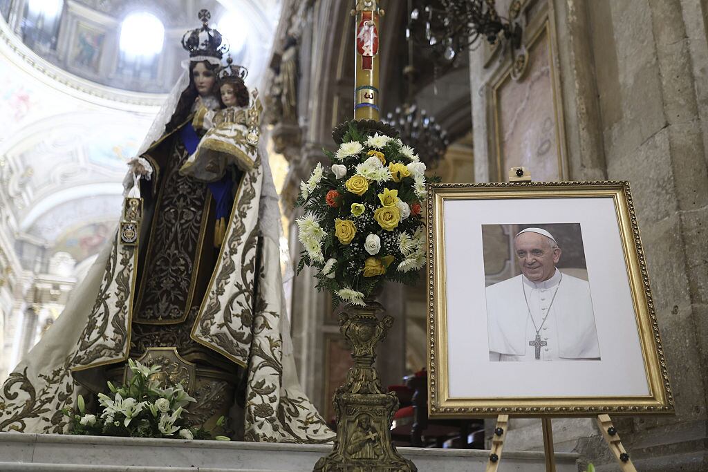 SANTIAGO, CHILE - APRIL 21: Images of Pope Francis, who died at 88, are seen in Santiago, Chile, on April 21. The pontiff passed away at 7:35 a.m. local time in Italy at his residence in Santa Marta. The news of his passing, announced by Cardinal Kevin Joseph Farrell the day after his last public appearance on Easter Sunday, sparked spontaneous gatherings, prayers and heartfelt tributes in churches across Santiago. (Photo by Lucas Aguayo Araos/Anadolu via Getty Images)
