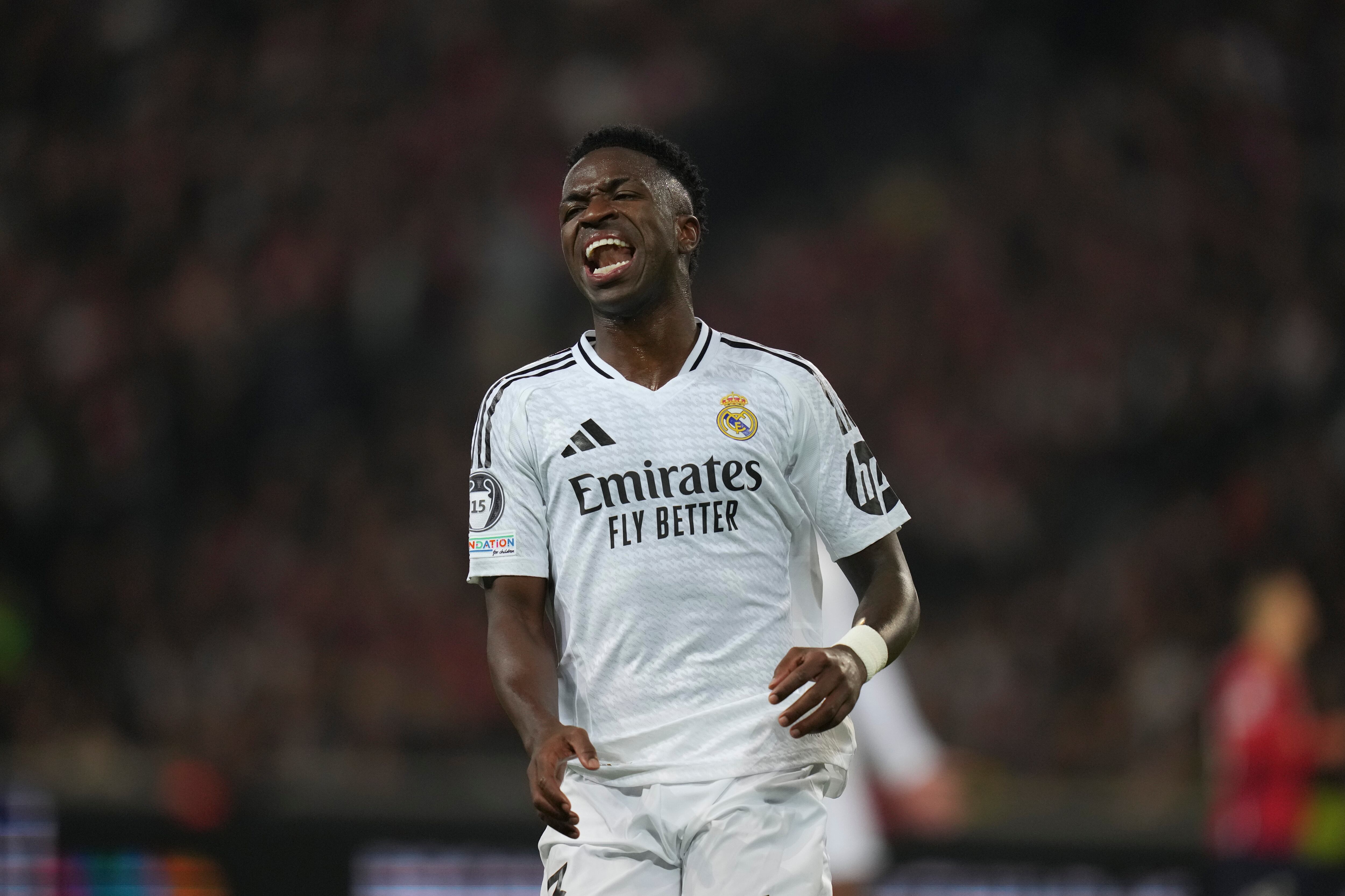 Real Madrid's Vinicius Junior reacts during the Champions League opening phase soccer match between Lille and Real Madrid at the Stade Pierre Mauroy in Villeneuve-d'Ascq, outside Lille, France, Wednesday, Oct. 2, 2024. (AP Photo/Thibault Camus)