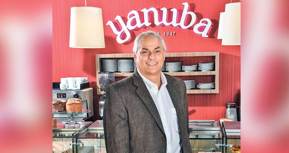 Yanuba fue fundada en 1947 por el danés Kai Hansen. Su nombre fue inspirado en la leyenda ancestral de la india Yanuba, que evoca la belleza de la hija del cacique quimbaya.