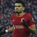 Liverpool's Luis Diaz celebrates after scoring his sides 3rd goal during the English Premier League soccer match between Liverpool and Norwich City and at Anfield stadium in Liverpool, England, Saturday, Feb. 19, 2022. (AP Photo/Rui Vieira)