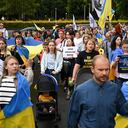 Members of Sydney's Ukraine community hold a candle light vigil to commemorate the one-year anniversary of Russia's invasion of Ukraine, in front of St. Mary's Cathedral in Sydney, Thursday, Feb. 23, 2023. (Dean Lewins/AAP Image via AP)