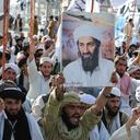 (FILES) In this file photograph taken on May 2, 2011, supporters of hardline pro-Taliban party Jamiat Ulema-i-Islam-Nazaryati (JUI-N) shout anti-US slogans during a protest in Quetta after the killing of Osama Bin Laden by US Special Forces in a ground operation in Pakistan's hill station of Abbottabad. - Almost every day, children play cricket in a patch of scorched grass and scattered rubble in Abbottabad -- all that remains of the final lair of the most wanted person on the planet. It was in this Pakistani city that Osama bin Laden was killed in the clandestine "Operation Geronimo" raid by US Navy Seals in the early hours of May 2, 2011. The operation had global repercussions and dented Pakistan's international reputation -- exposing contradictions in a country that had long served as a rear base for Al Qaeda and its Taliban allies while suffering from the effects of terrorism. (Photo by Banaras KHAN / AFP)