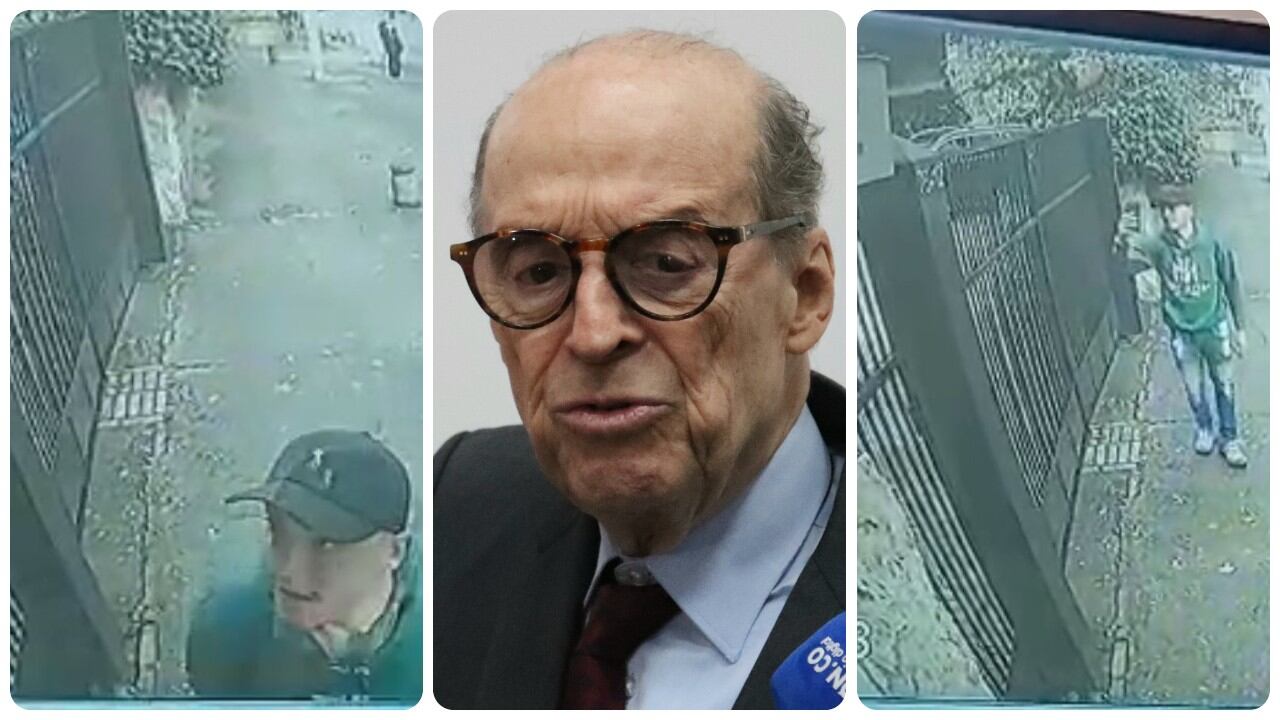 Álvaro Leyva y el hombre que le toma fotografías a las afueras de su vivienda en Bogotá.