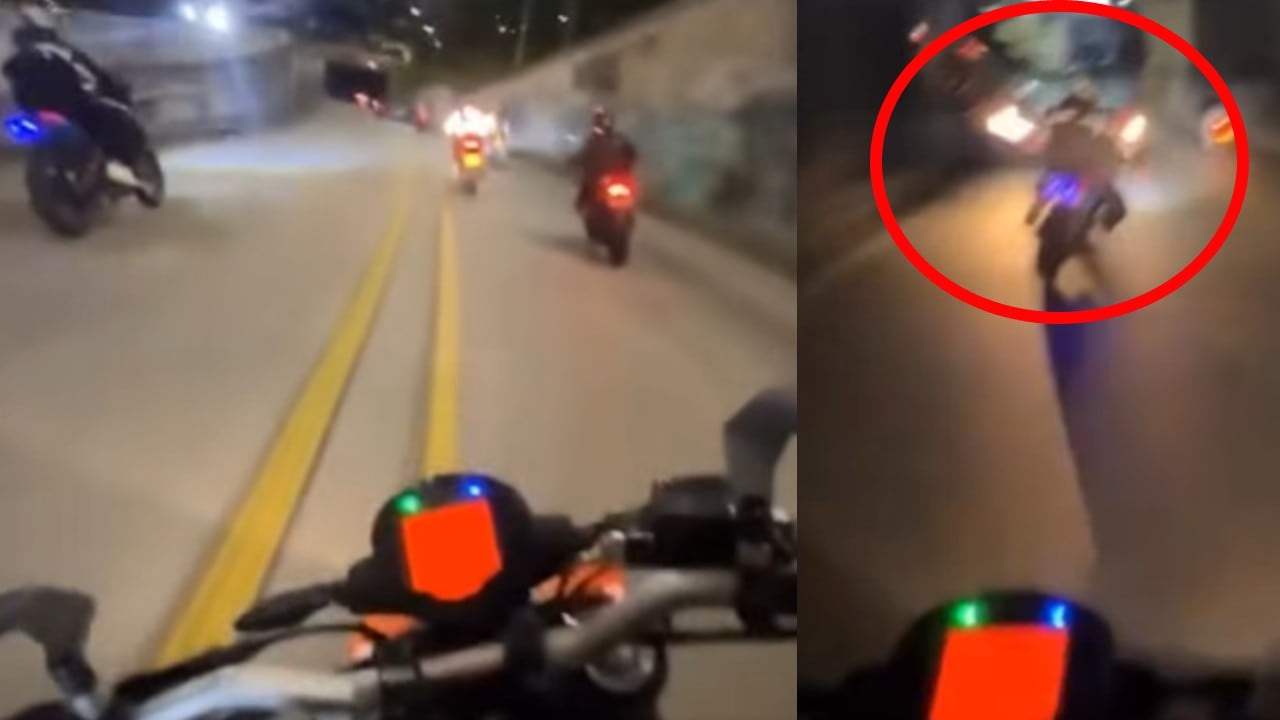 Momento exacto en que un motociclista queda frente a frente con un articulado que transitaba en sentido contrario.