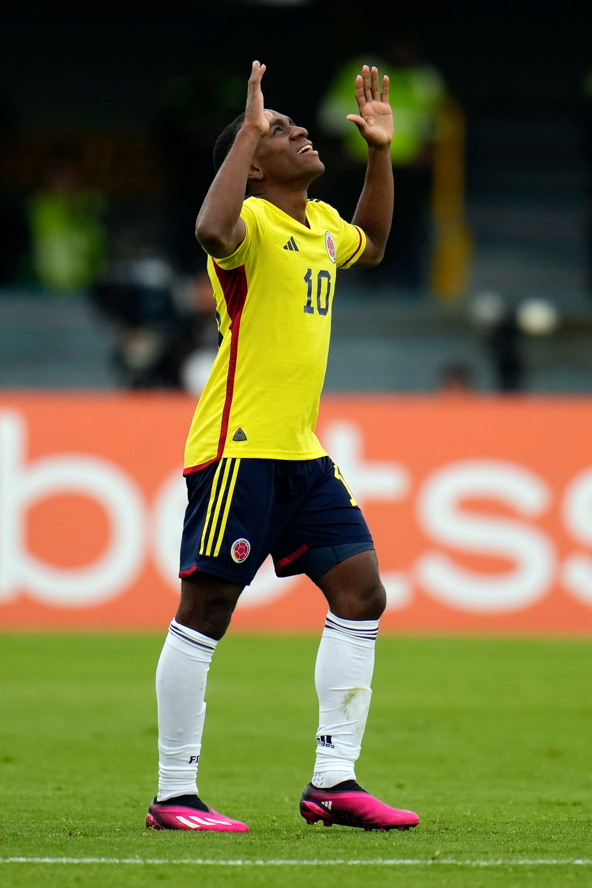 Colombia's Alexis Castillo celebrates with teammates after scoring his side's opening goal against Venezuela during a South America U-20 soccer match in Bogota, Colombia, Sunday, Feb. 12, 2023. (AP Photo/Fernando Vergara)