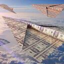 Currency bills folded into paper airplanes in atmosphere