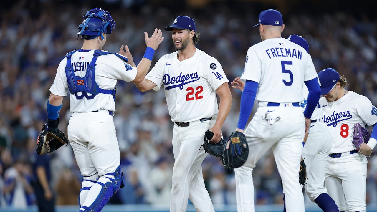 LOS ANGELES, CALIFORNIA - SEPTEMBER 19: Clayton Kershaw #22 of the Los Angeles Dodgers is congratulated by Dalton Rushing #68 as he is removed from the game during the fifth inning against the San Francisco Giants at Dodger Stadium on September 19, 2025 in Los Angeles, California. (Photo by Ronald Martinez/Getty Images)