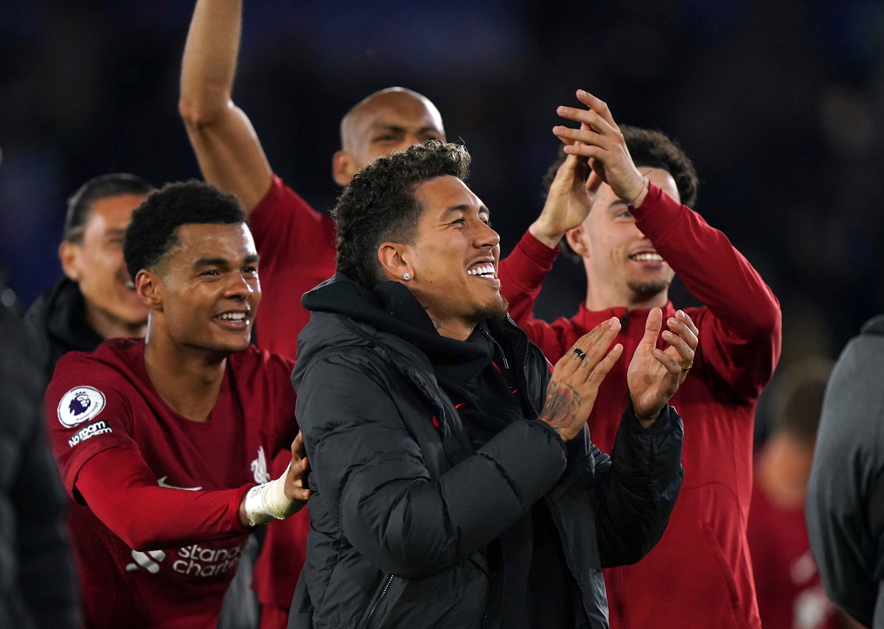Liverpool's Roberto Firmino gestures to the crowd after the English Premier League soccer match between Leicester City and Liverpool at the King Power Stadium, Leicester, England, Monday May 15, 2023. (Tim Goode/PA via AP)