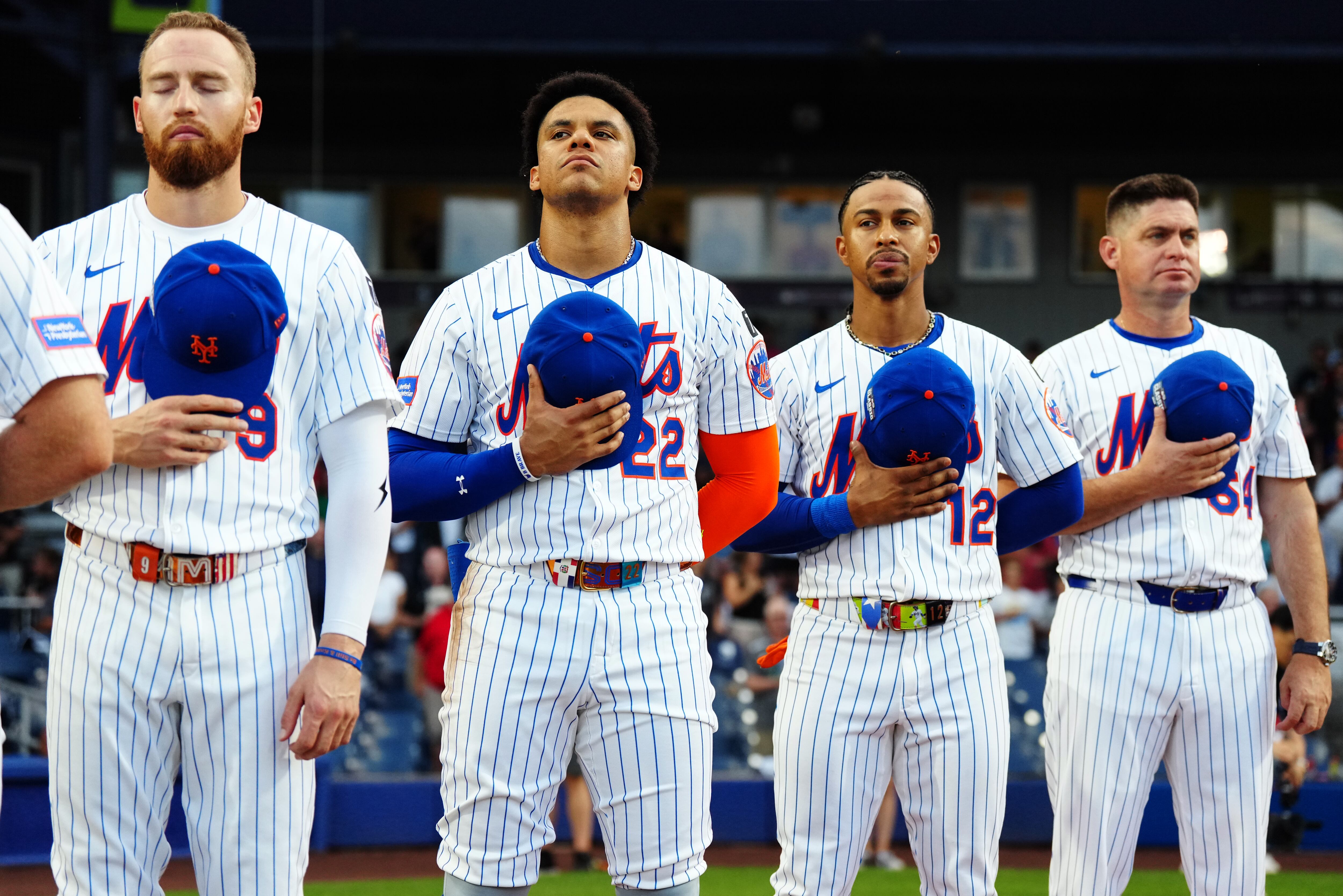 WILLIAMSPORT , PA - AUGUST 17: Members of the New York Mets look on during the singing of the national anthem prior to the 2025 MLB Little League Classic presented by New York Life between the Seattle Mariners and the New York Mets at Journey Bank Ballpark at Historic Bowman Field on Sunday, August 17, 2025 in Williamsport , Pennsylvania. (Photo by Mary DeCicco/MLB Photos via Getty Images)