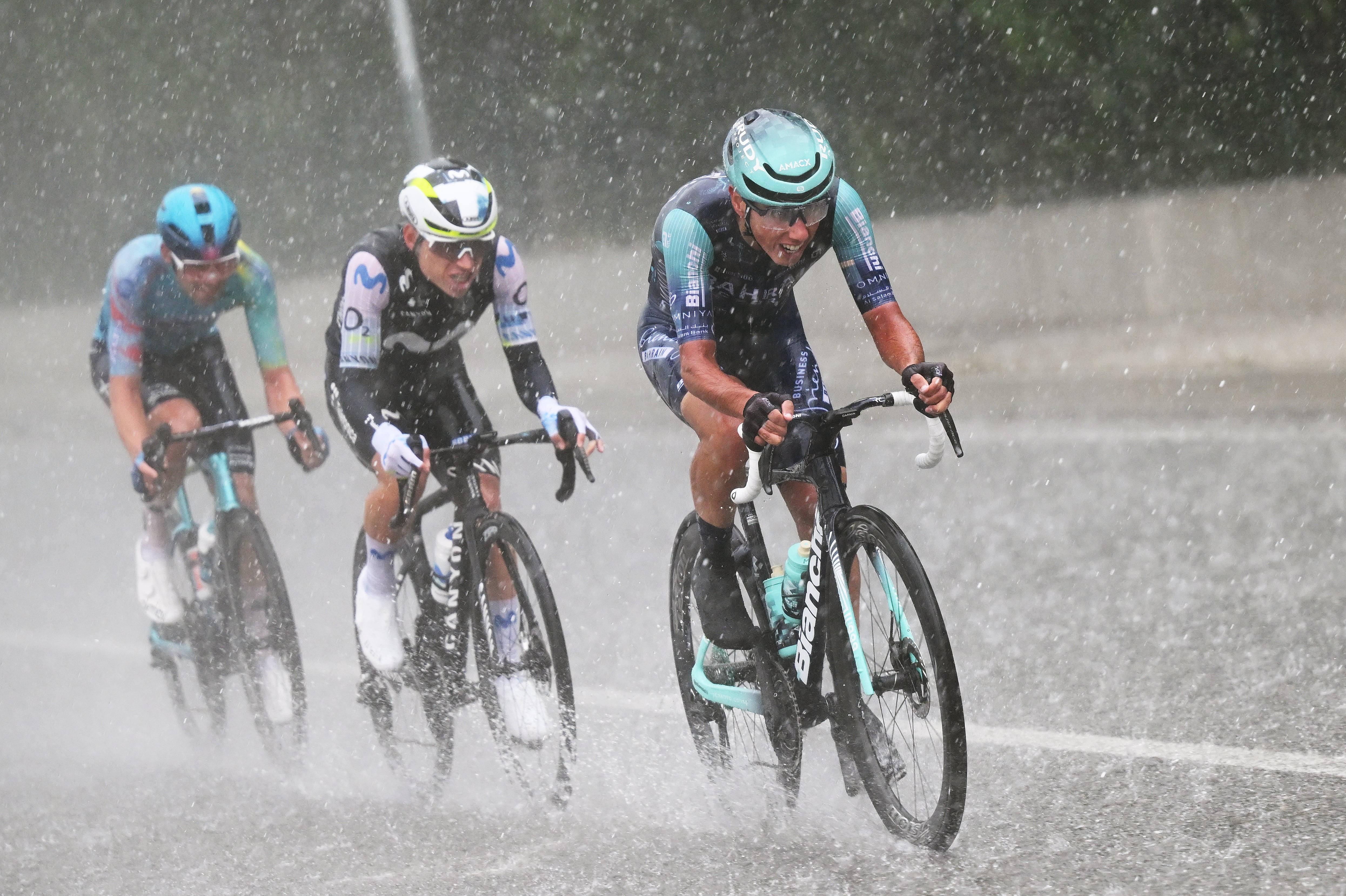 POTENZA, ITALY - MAY 13: (L-R) Guillermo Thomas Silva of Uruguay and Team XDS Astana, Einer Rubio of Colombia and Team Movistar and Afonso Eulalio of Portugal and Team Bahrain - Victorious compete in the breakaway while it is raining heavily during the 109th Giro d'Italia 2026, Stage 5 a 203km stage from Praia a Mare to Potenza 705m / #UCIWT / on May 13, 2026 in Potenza, Italy. (Photo by Dario Belingheri/Getty Images)