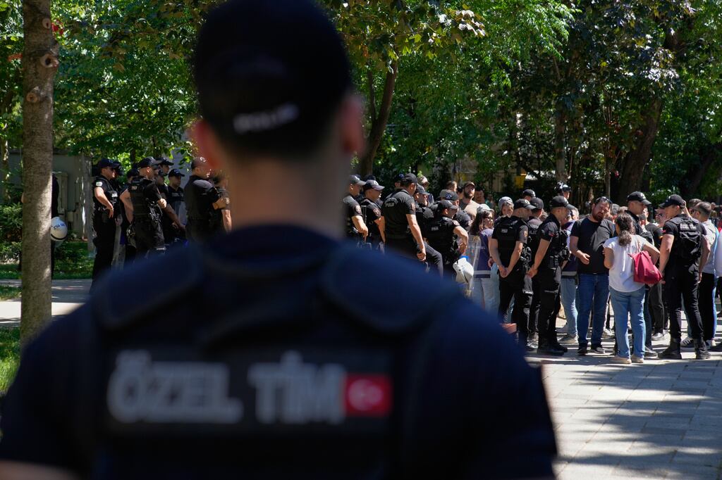 Police block and detain some protesters as they try to march in support of transgender people and their rights during the LGBTQ Pride week, in Istanbul, Turkey, Sunday, June 21, 2026. (AP Photo/Dilara Acikgoz)