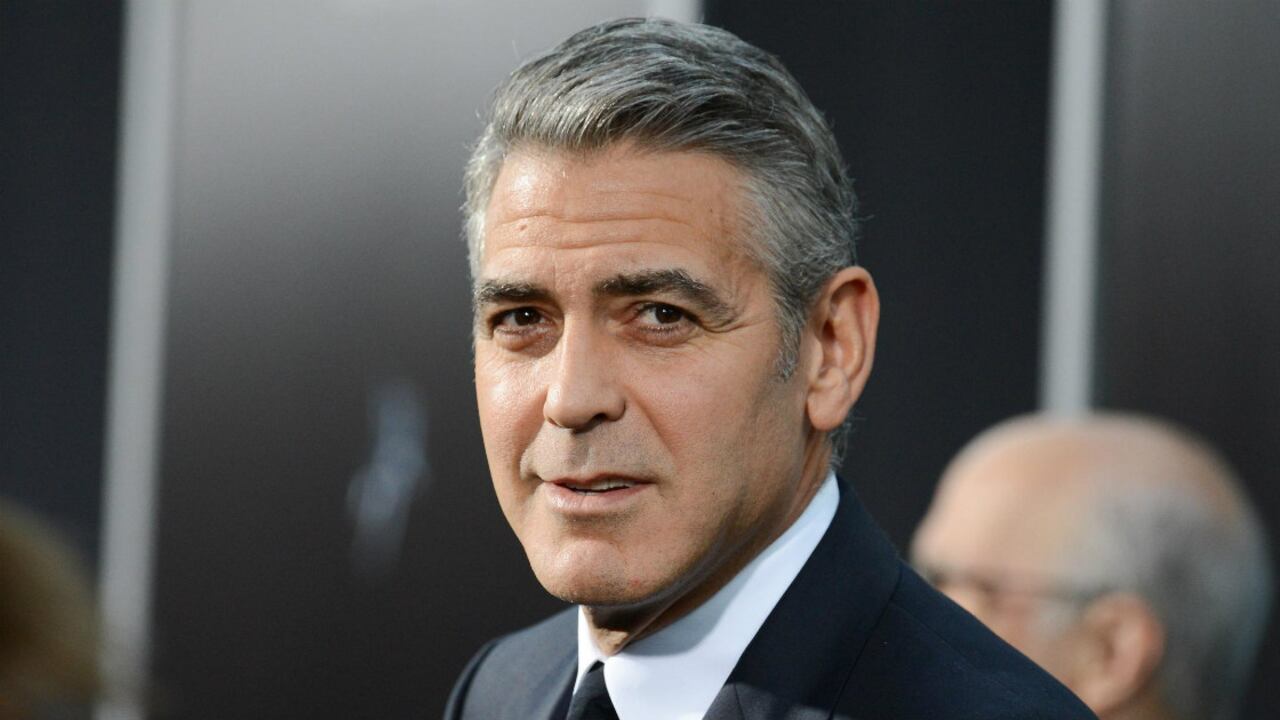 El actor George Clooney y su prometida, Amal Alamuddin posan junto al empresario estadounidense Rande Gerber y la modelo Cindy Crawford en Venecia (Italia)