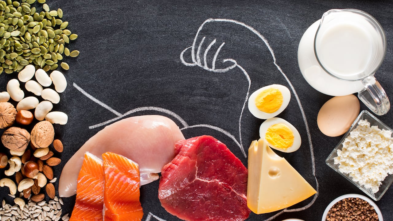 High protein food for body builders as meat, fish, dairy, eggs, buckwheat, oatmeal, nuts, bean, pumpkin seed and sunflower seed. Top view.