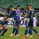 Players of Argentina's Boca Juniors react at the end of a Copa Libertadores round of 16 second leg soccer match against Brazil's Atletico Mineiro in Belo Horizonte, Brazil, Tuesday, July 20, 2021. Atletico Mineiro defeated Boca Juniors 3-1 in a penalty shootout after the game ended in a 0-0 draw. (AP Photo/Bruna Prado, Pool)