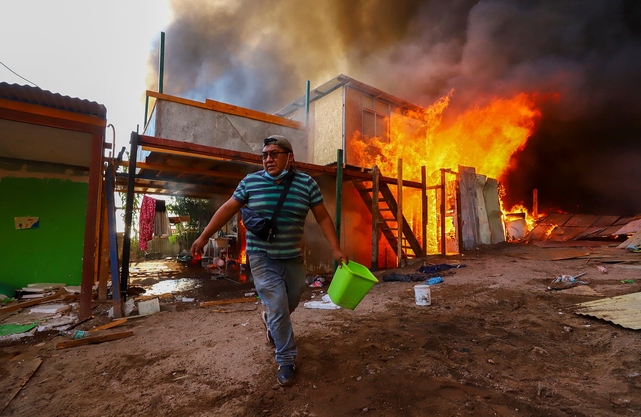 incendio en barrio de migrantes en Chile