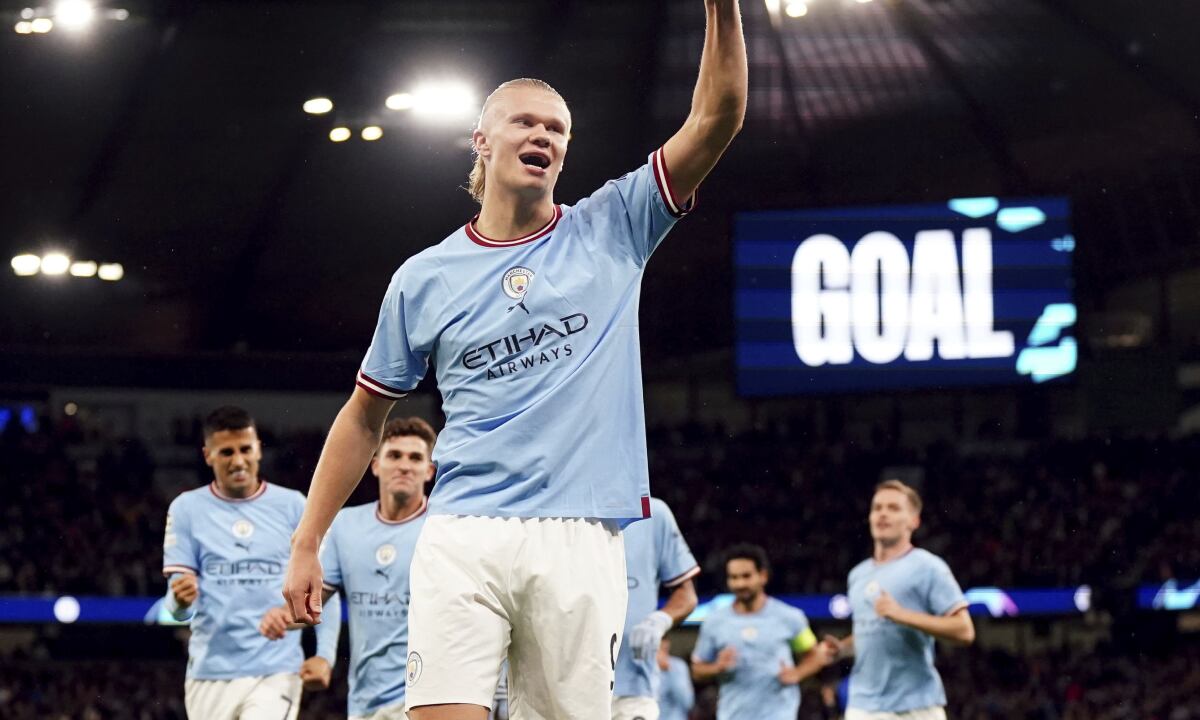 Manchester City's Erling Haaland celebrates after scoring his side's opening goal during the Champions League soccer match between Manchester City and FC Copenhagen at the Etihad stadium in Manchester, England, Wednesday, Oct. 5, 2022. (AP/Nick Potts/PA)