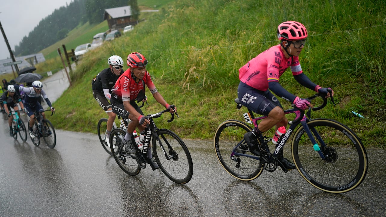 Colombia's Sergio Andres Higuita, Colombia's Nairo Quintana, Australia's Ben O'Connor, Michael Woods of Canada and Australia's Lucas Hamilton, from front right to rear, climb Col du Pre pass during the ninth stage of the Tour de France cycling race over 144.9 kilometers (90 miles) with start in Cluses and finish in Tignes, France, Sunday, July 4, 2021. (AP Photo/Daniel Cole)