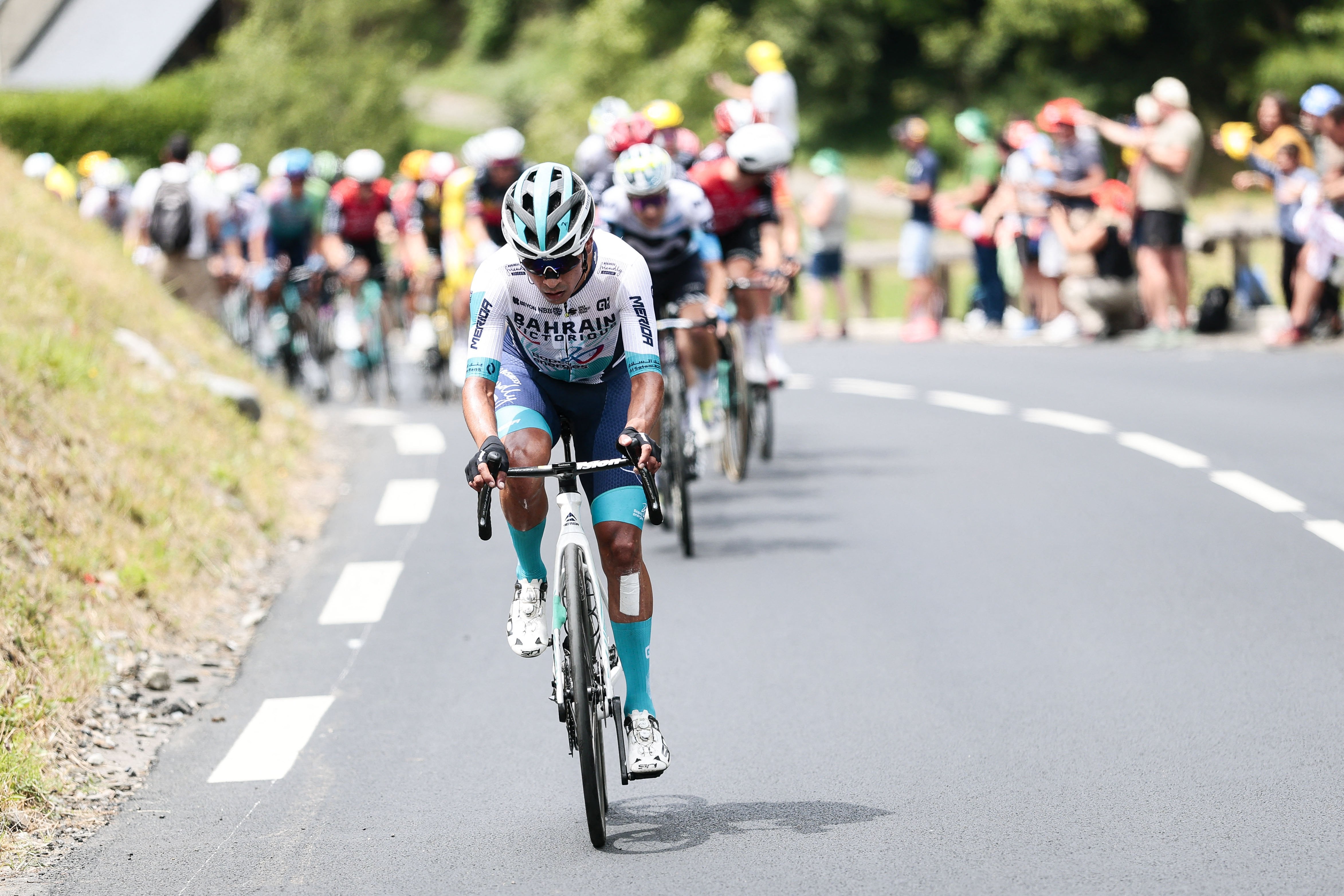 Colombian Santiago Buitrago Sanchez of Bahrain Victorious pictured in action during stage 14 of the 2025 Tour de France cycling race, from Pau to Luchon-Superbagneres (183 km), on Saturday 19 July 2025 in France. The 112th edition of the Tour de France starts on Saturday 5 July in Lille, France, and will finish in Paris, France on the 27th of July. BELGA PHOTO POOL LUCA BETTINI (Photo by POOL LUCA BETTINI / BELGA MAG / Belga via AFP)