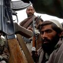 A group of Anti-Taliban fighters sit in the back of a pick-up truck as they wait to join in the pursuit of the remaining Taliban and al-Qaeda fighters. The Alliance has captured Tora Bora and some Taliban fighters, 19 of which were displayed later in the day. The remaining Taliban are said to have fled into the hills. (Craig F Walker/The Denver Post) (Photo By Craig F. Walker/The Denver Post via Getty Images)