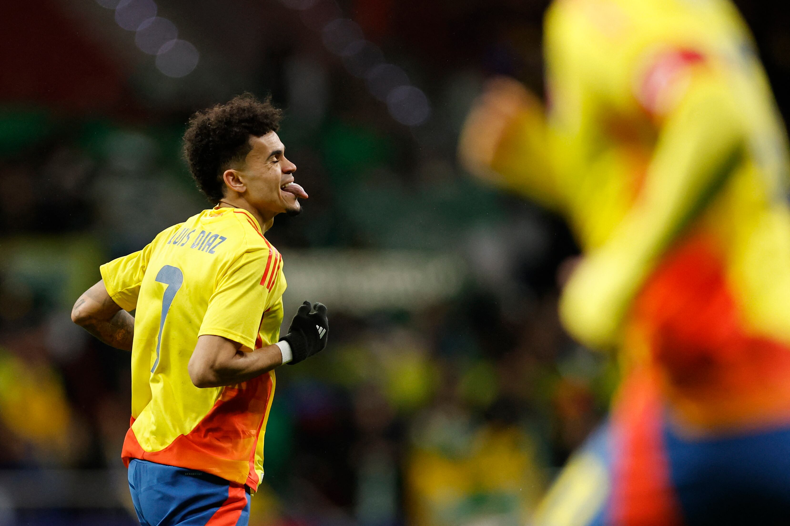 Colombia's forward #07 Luis Diaz grimances during the international friendly football match between Romania and Colombia at the Metropolitano stadium in Madrid on March 26, 2024. (Photo by OSCAR DEL POZO / AFP)