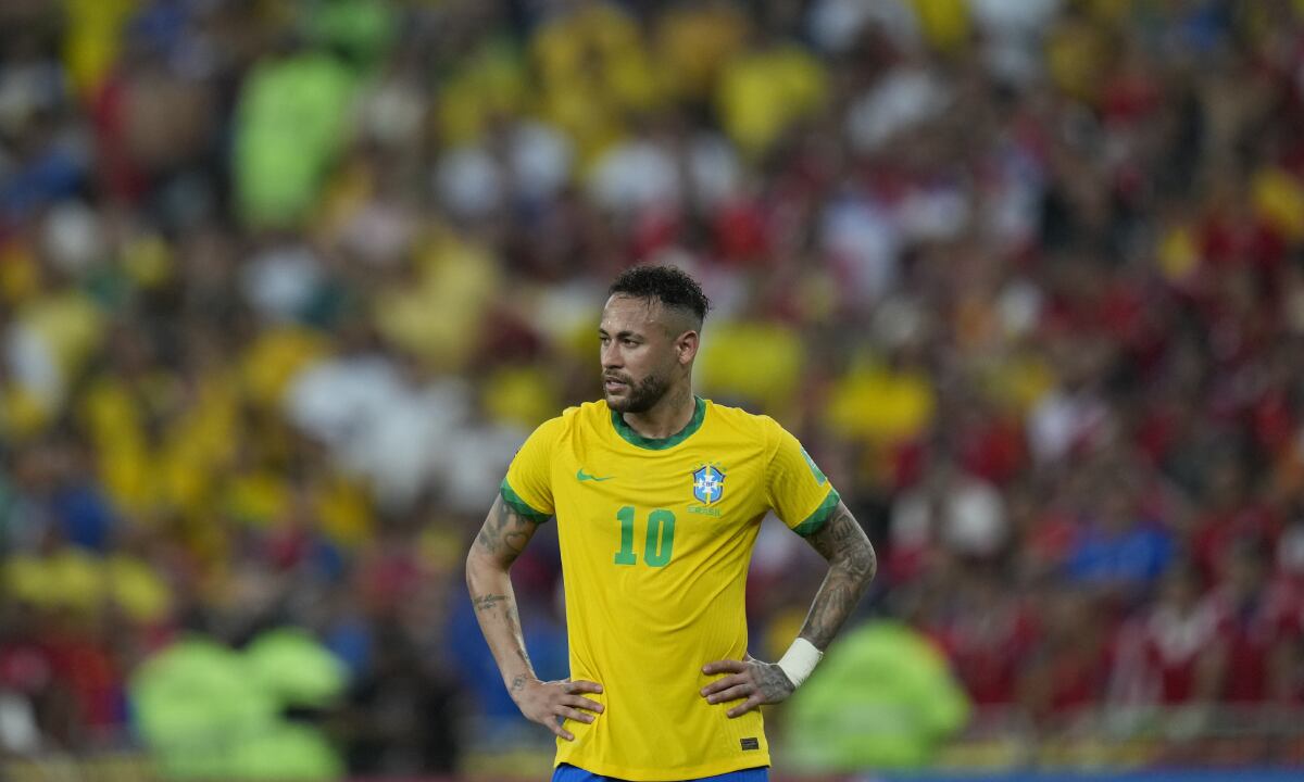Brazil's Neymar looks on during a qualifying soccer match for the FIFA World Cup Qatar 2022 against Chile at Maracana stadium in Rio de Janeiro, Brazil, Thursday, March 24, 2022. (AP/Silvia Izquierdo)