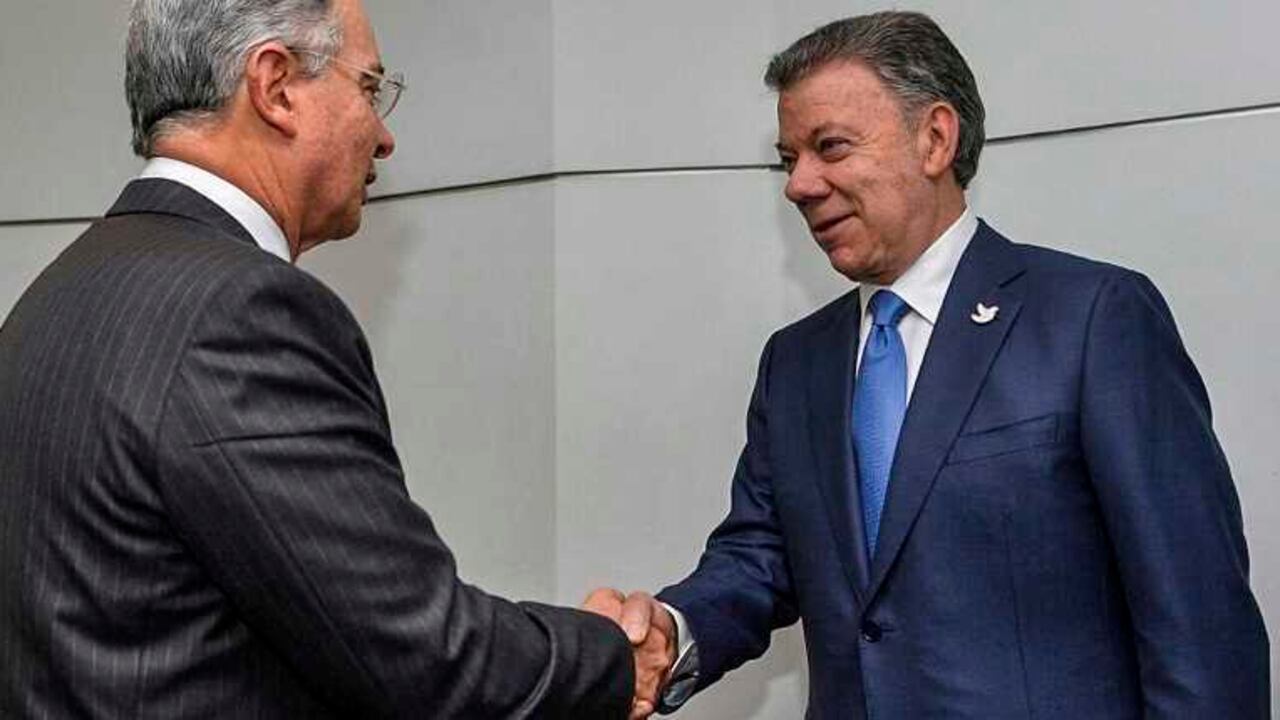 Álvaro Uribe y Juan Manuel Santos.