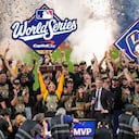 Milwaukee Brewers catcher William Contreras holds the MVP trophy after winning baseball's World Series against the Tampa Bay Rays, Wednesday, Oct. 28, 2026, in St. Petersburg, Fla. (AP Photo/Morry Gash)