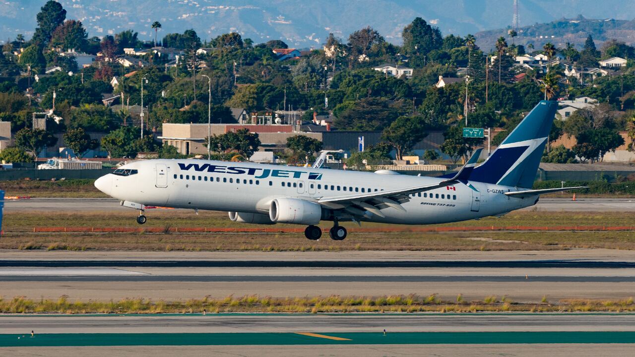 WestJet airlines Boeing 737-8CT arrives at Los Angeles International Airport