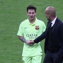 MUNICH, GERMANY - MAY 12: Team coach Josep Guardiola (R) of Bayern Muenchen shakes hands with Lionel Messi of FC Barcelona during half-time of the UEFA Champions League semi final second leg match between FC Bayern Muenchen and FC Barcelona at Allianz Arena on May 12, 2015 in Munich, Germany. (Photo by A. Beier/FC Bayern via Getty Images)