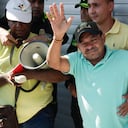 Luis Manuel Díaz waves to neighbors outside his home in Barrancas, Colombia, after he was released by kidnappers Thursday, Nov. 9, 2023. Díaz, the father of Liverpool striker Luis Díaz, was kidnapped on Oct. 28 by the guerrilla group National Liberation Army, or ELN. (AP Photo/Ivan Valencia)