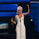 CORAL GABLES, FLORIDA - OCTOBER 05: Karol G speaks onstage during the 2023 Billboard Latin Music Awards at Watsco Center on October 05, 2023 in Coral Gables, Florida. (Photo by Jason Koerner/Getty Images)