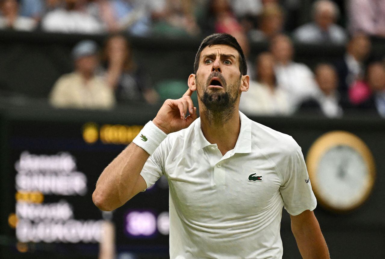 Tennis - Wimbledon - All England Lawn Tennis and Croquet Club, London, Britain - July 14, 2023 Serbia's Novak Djokovic reacts during his semi final match against Italy's Jannik Sinner REUTERS/Dylan Martinez     TPX IMAGES OF THE DAY